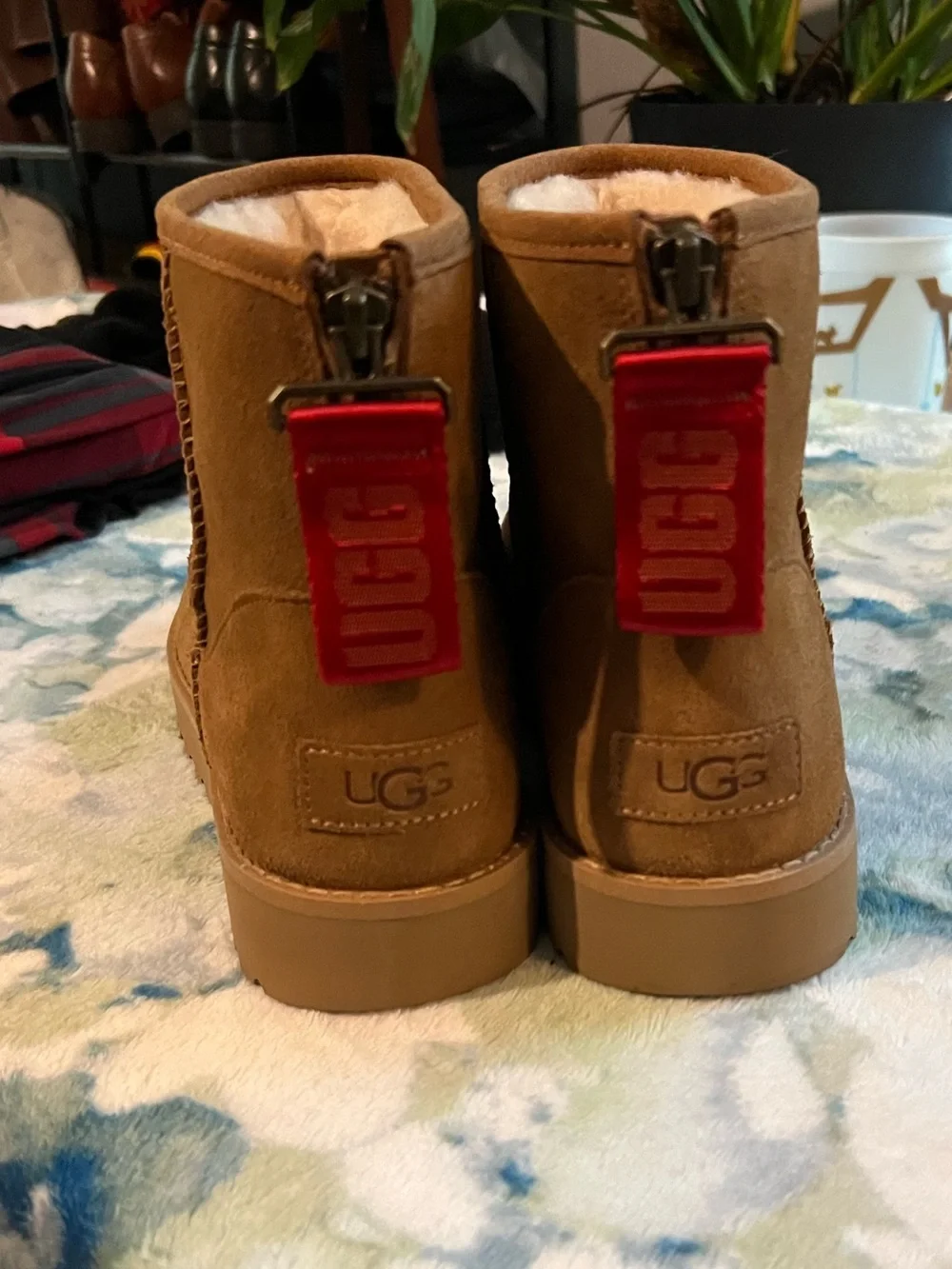 UGG mini Chestnut Suede Boots with Red Tag Zipper